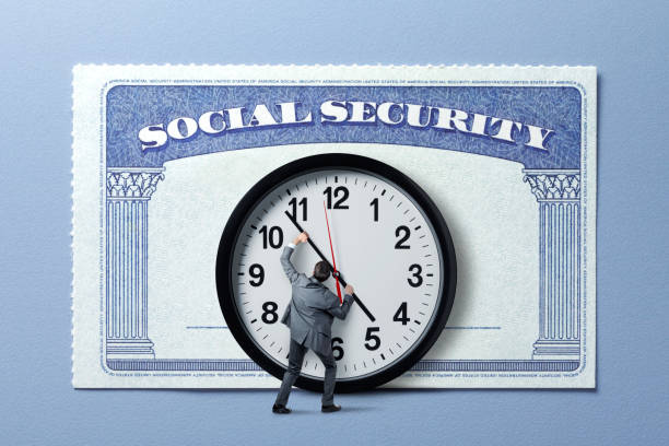 A man in a suit adjusting the hands on a large clock in front of a Social Security sign, symbolizing what happens when someone on SSI turns 62.